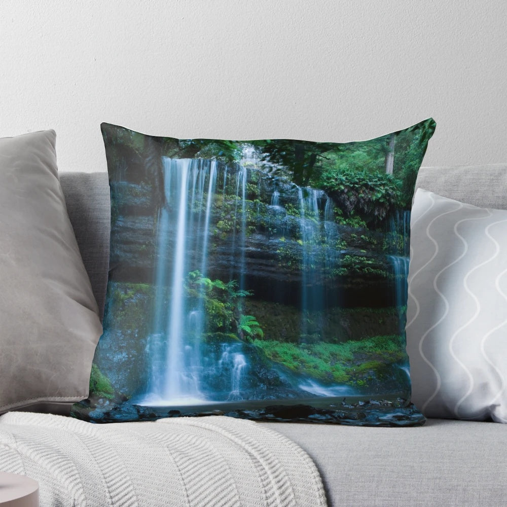 Breathtaking view of the cascading Russell Falls in Tasmania, a popular tourist destination.