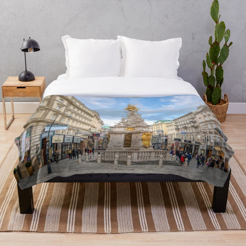 Plague Column or Holy Trinity Column in Vienna, Austria plush blanket