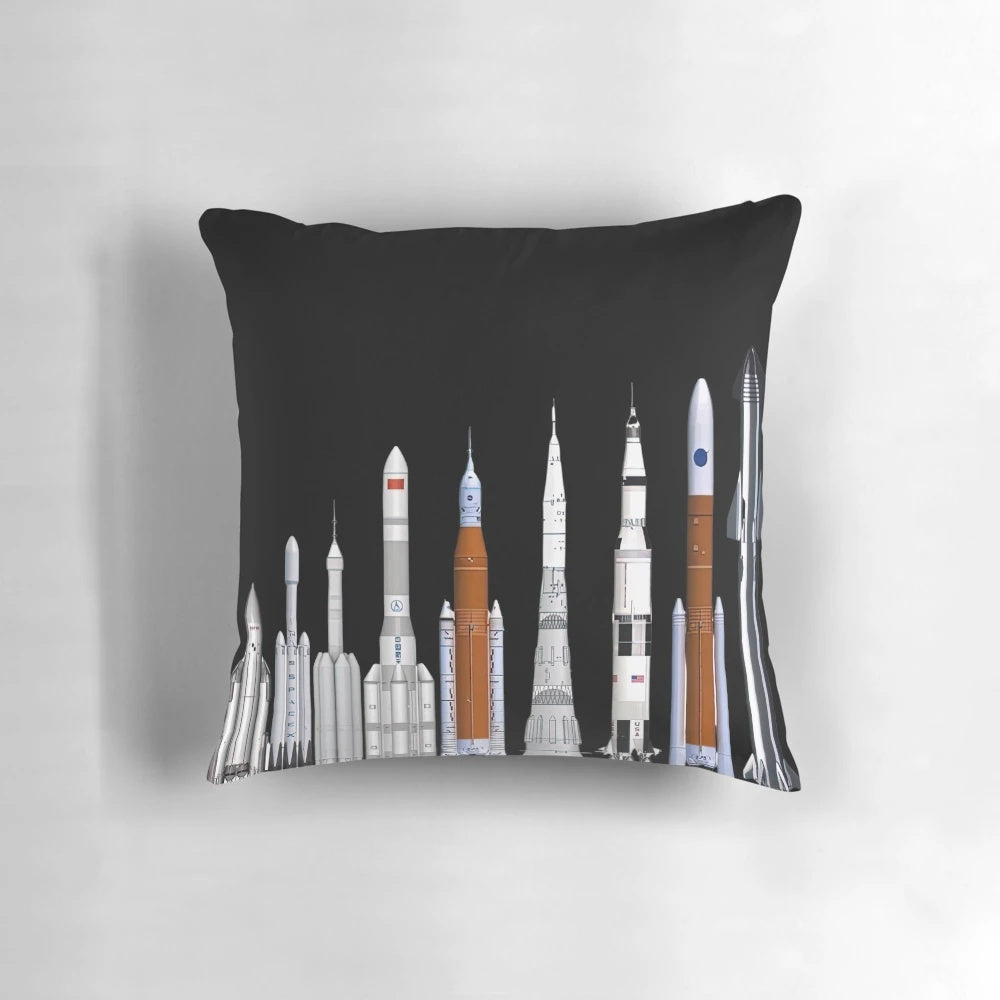 Pillow featuring illustrations of various rockets and spacecraft from NASA and SpaceX.