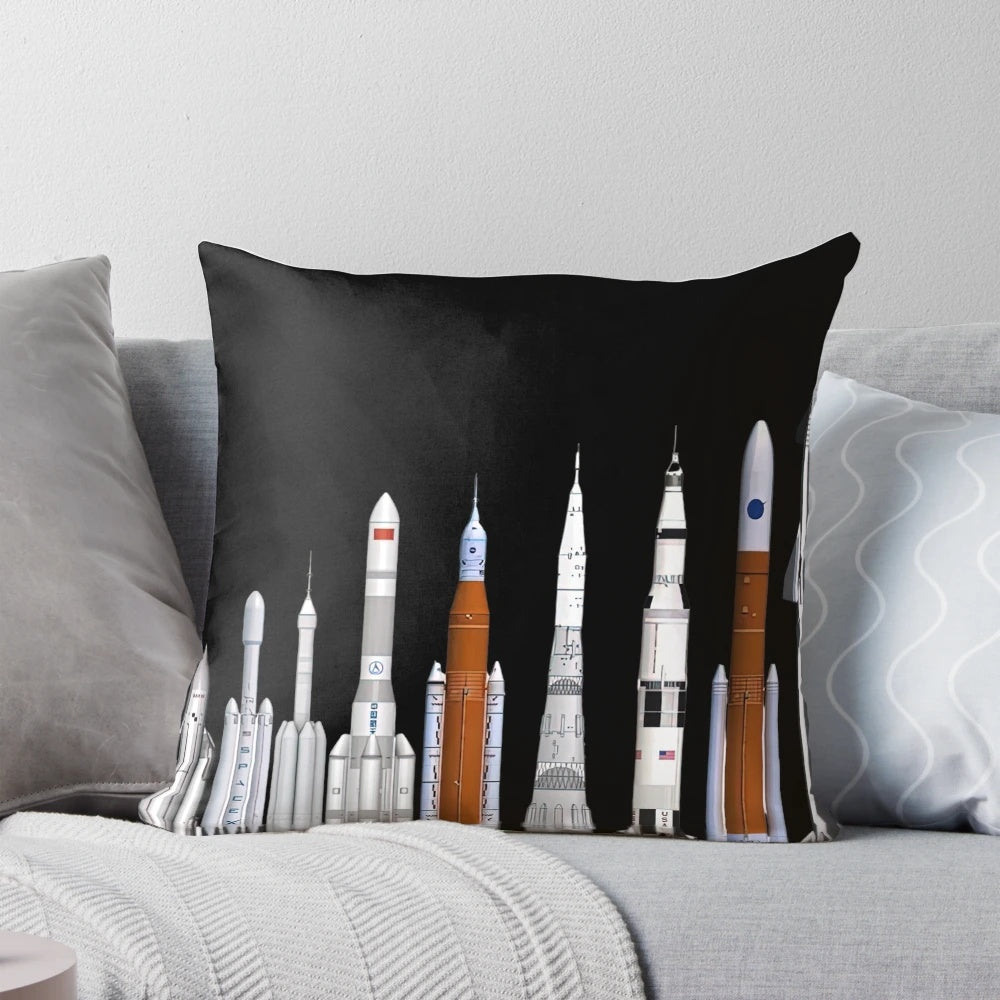 Pillow featuring illustrations of various rockets and spacecraft from NASA and SpaceX.