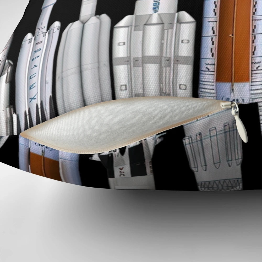Pillow featuring illustrations of various rockets and spacecraft from NASA and SpaceX.