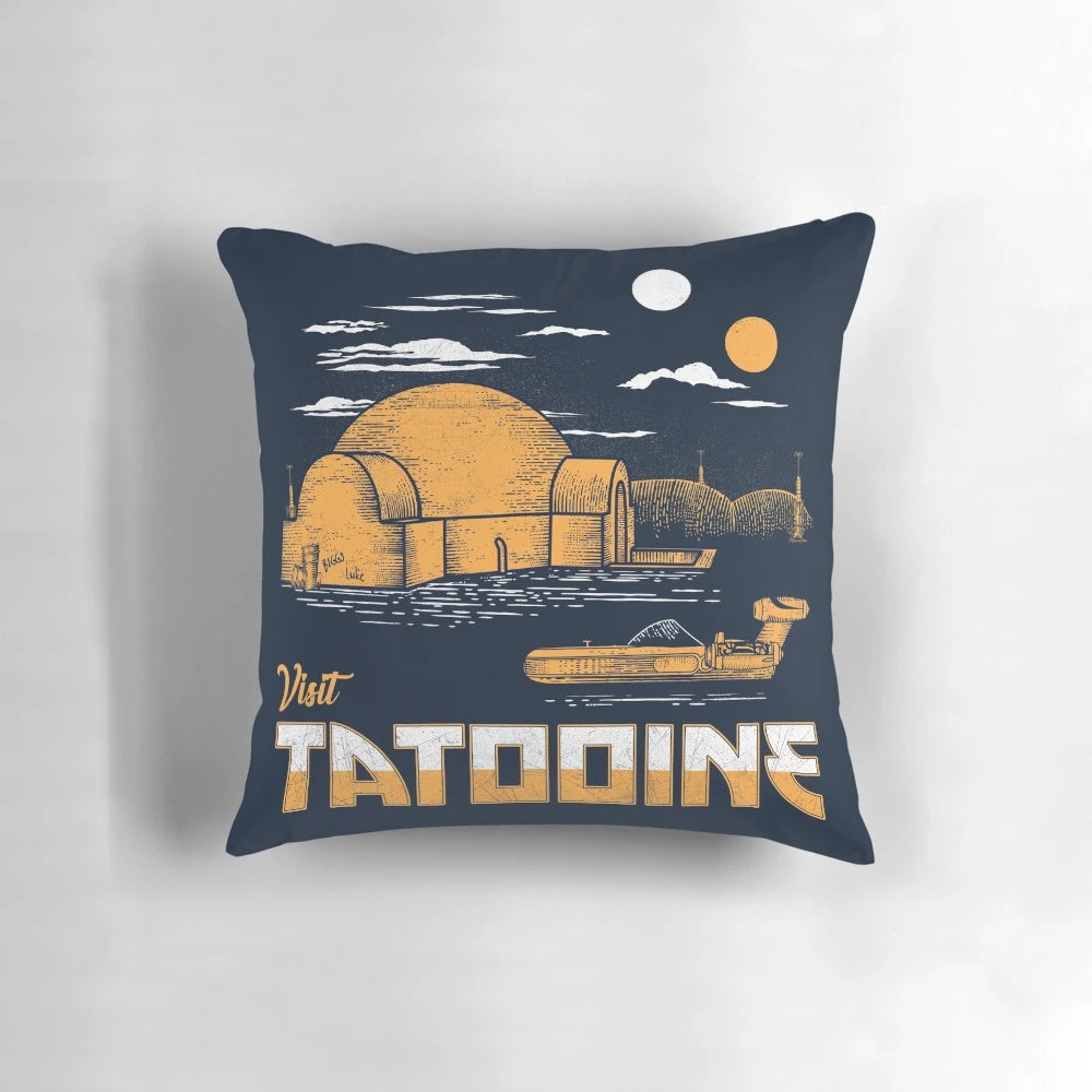 A soft, plush pillow featuring the desert planet Tatooine from the Star Wars universe.