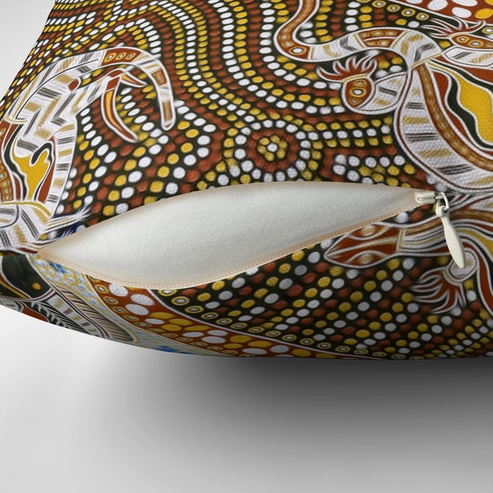 Colorful and intricate aboriginal art design featuring turtles, goannas, and other iconic Australian animals on a premium throw pillow.