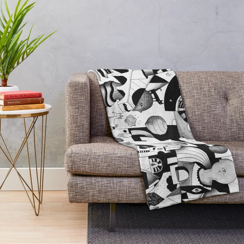 Plush blanket with abstract adventure-themed design