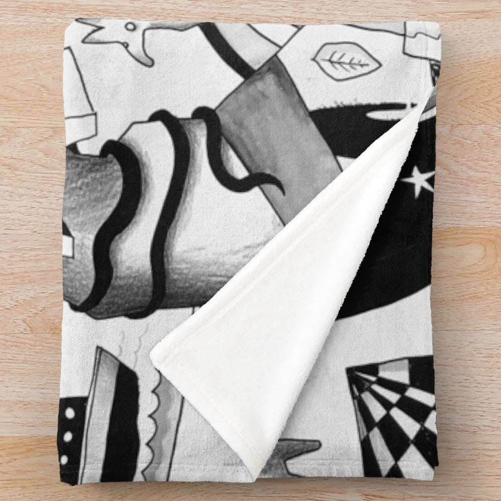 Plush blanket with abstract adventure-themed design