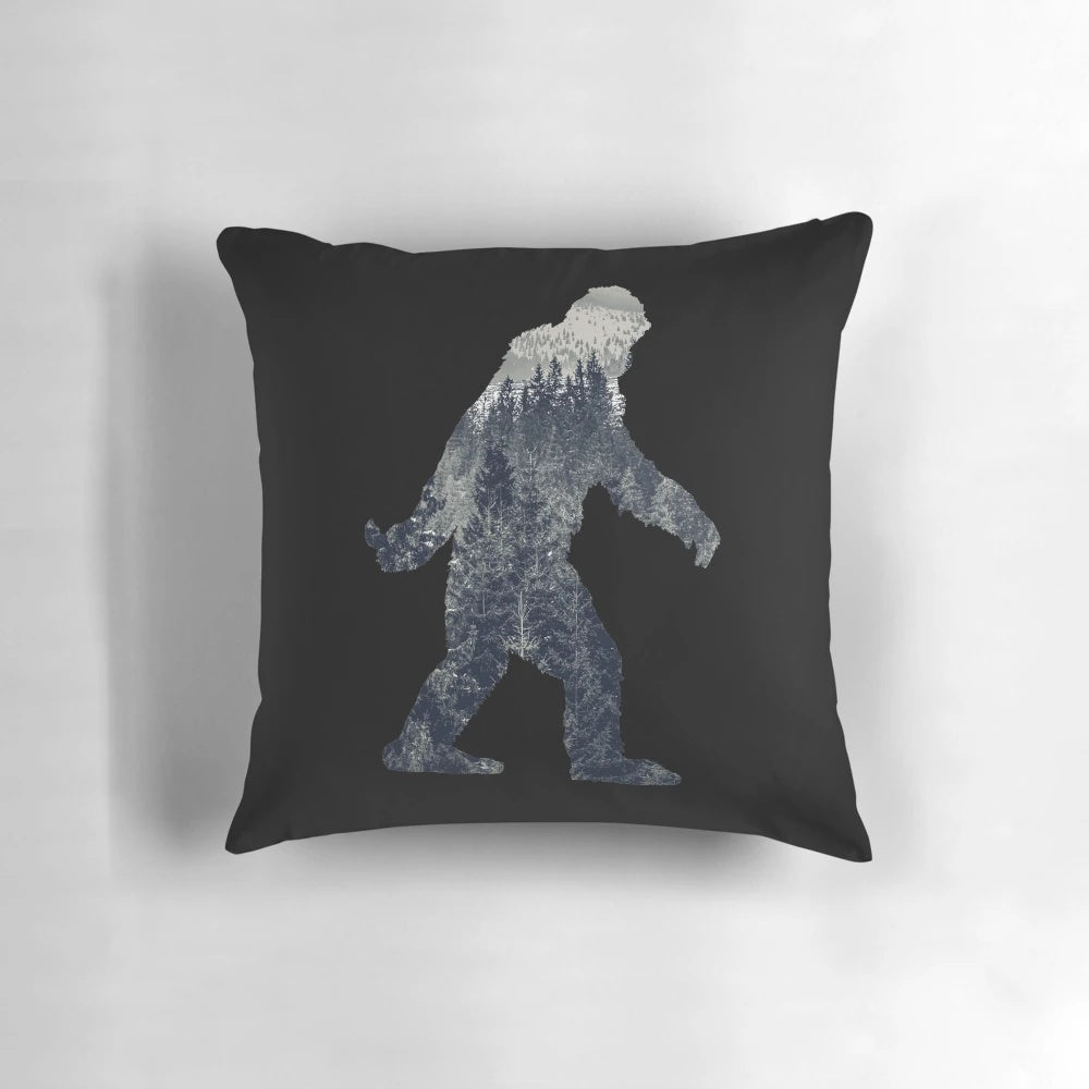 A Sasquatch silhouette on a pillow design, perfect for outdoor enthusiasts and nature lovers.