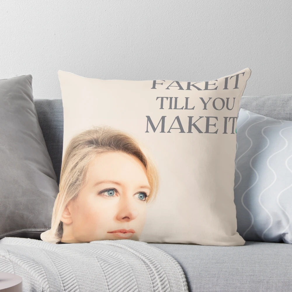 Elizabeth Holmes "Fake It Till You Make It" Pillow, featuring the Theranos logo and references to the business scandal