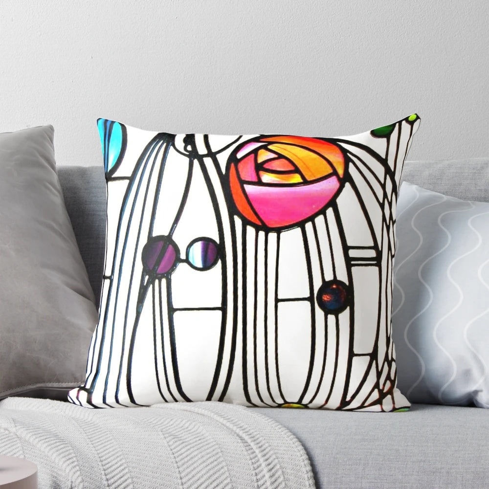 Vibrant floral cushion featuring the iconic designs of Scottish architect and artist Charles Rennie Mackintosh