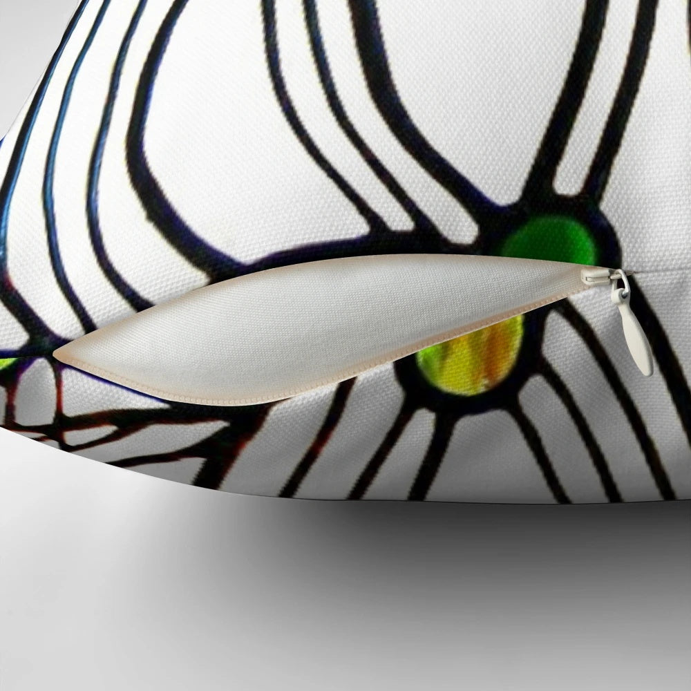 Vibrant floral cushion featuring the iconic designs of Scottish architect and artist Charles Rennie Mackintosh