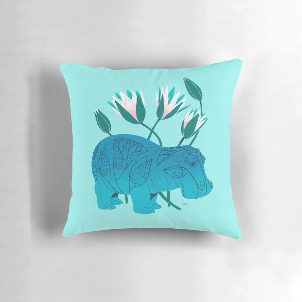 Faience hippo pillow with intricate floral designs, inspired by ancient Egyptian art and culture
