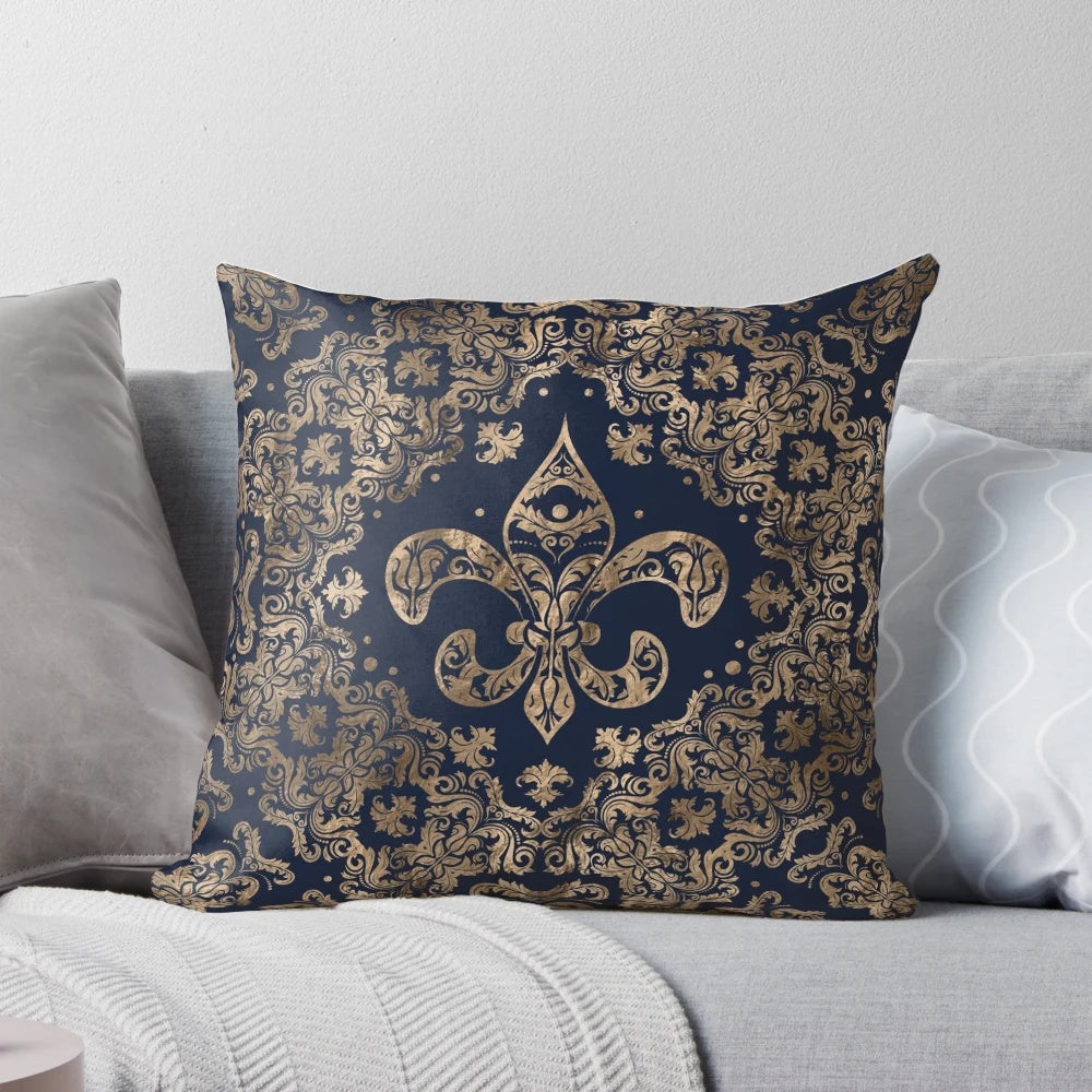 Luxurious golden and dark blue accent pillow featuring a beautiful fleur-de-lis design