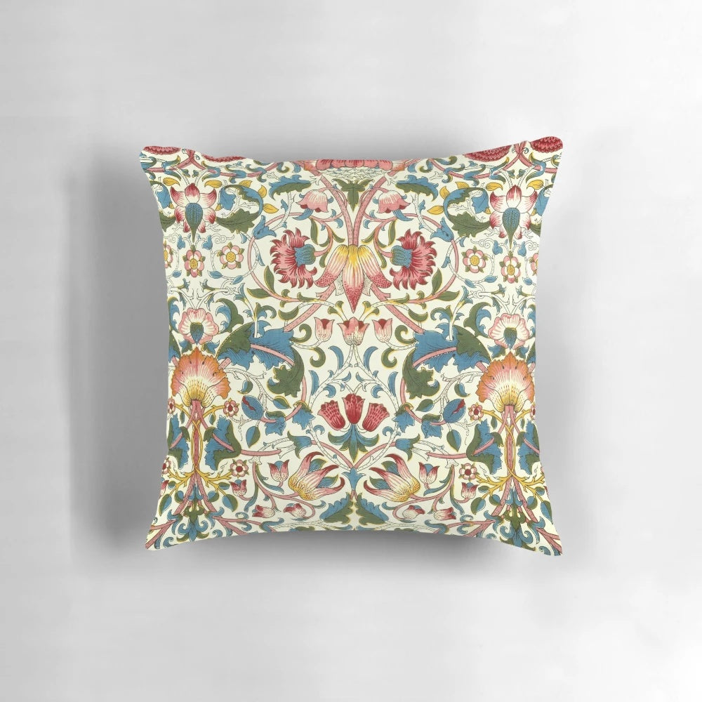 Close-up of a beautifully detailed, vintage-inspired floral pattern pillow in the Lodden style by William Morris.