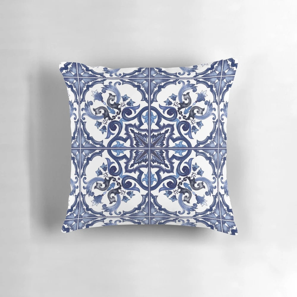 A blue, ornate floral Mediterranean Sicilian tile design decorative pillow