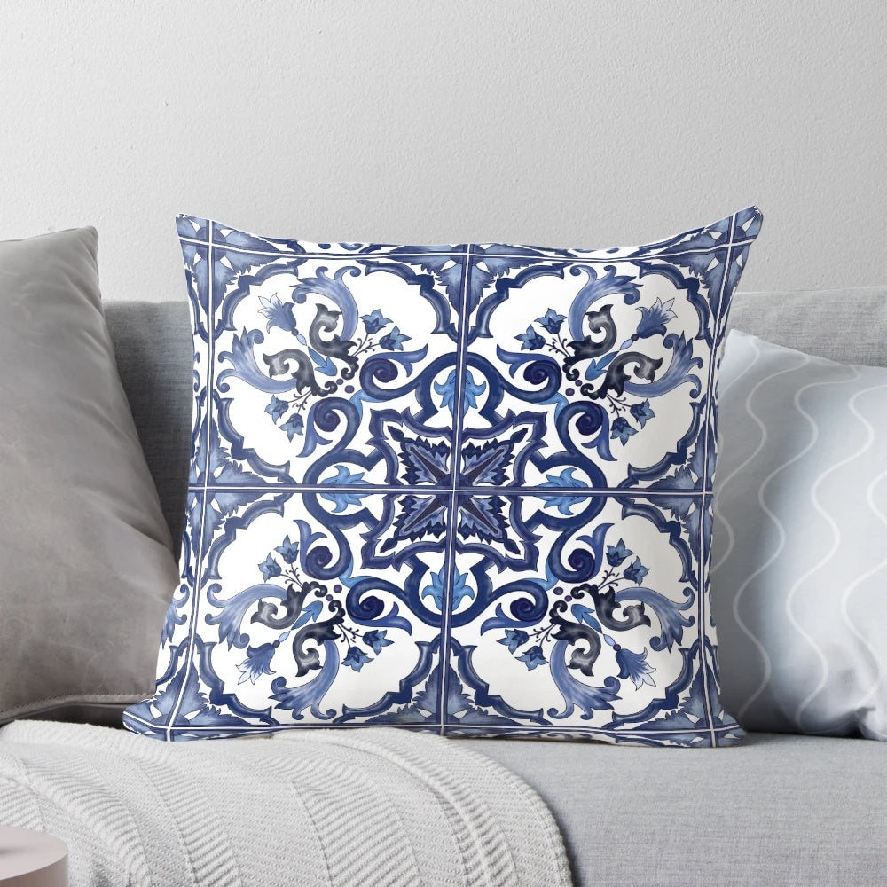 A blue, ornate floral Mediterranean Sicilian tile design decorative pillow