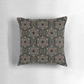 Ornate Persian-inspired pillow with intricate floral and geometric patterns