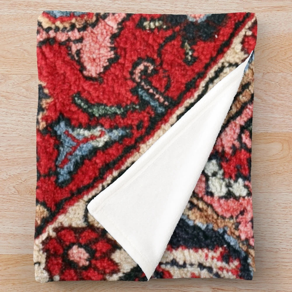 Persian-inspired plush blanket with colorful floral and abstract carpet design