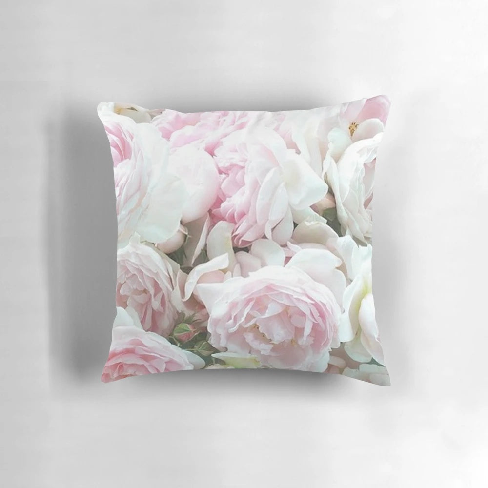 Vibrant pink and white peonies in full bloom, captured in a stunning close-up photograph and printed on a soft, plush throw pillow.