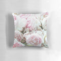 Vibrant pink and white peonies in full bloom, captured in a stunning close-up photograph and printed on a soft, plush throw pillow.