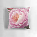 Beautiful pink peony flowers on a soft, plush throw pillow