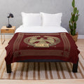 Plush blanket featuring the Roman Empire's iconic gold imperial eagle emblem on a rich red velvet backdrop