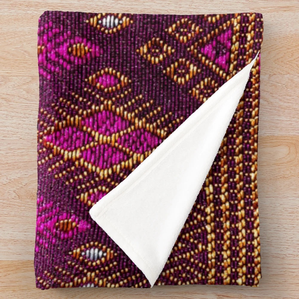 Thai silk plush blanket with pink gold tones and traditional silkworm design