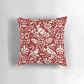 Luxurious deep red and cream pillow featuring a beautiful pheasant and hare pattern in the art nouveau style