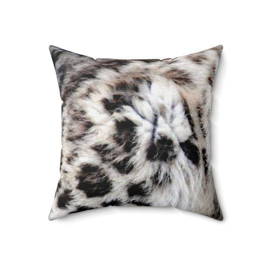 Colorful abstract design featuring a snow leopard print on a decorative throw pillow