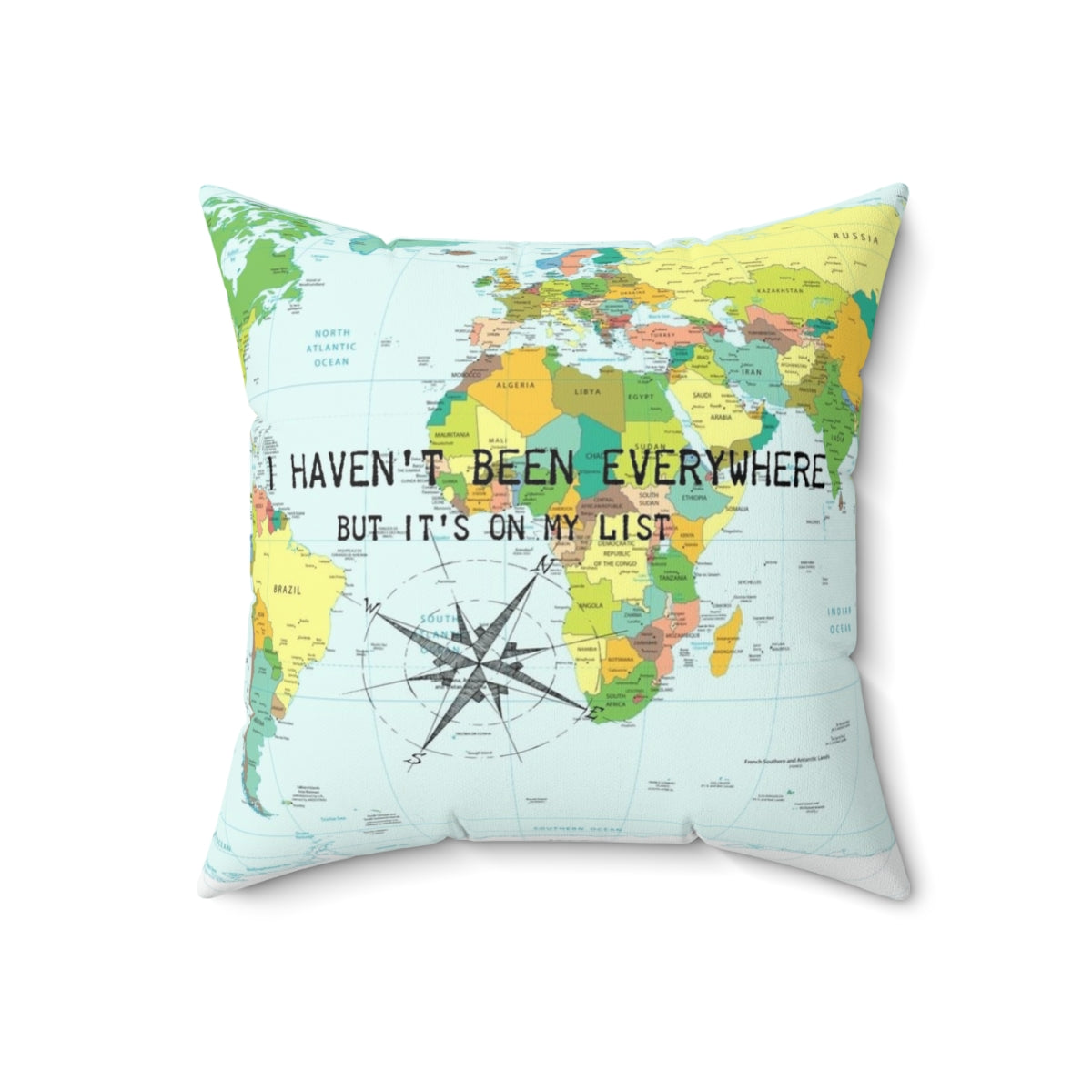 A throw pillow featuring the travel quote "I haven't been everywhere but it's on my list" with a compass rose and world map design. - Back