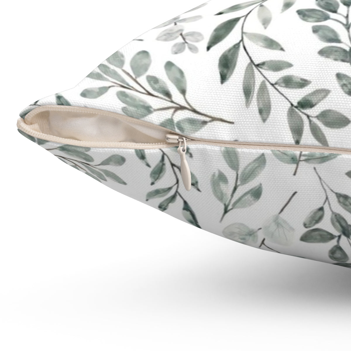 Watercolor painting of green eucalyptus leaves on a decorative pillow cover - Detail