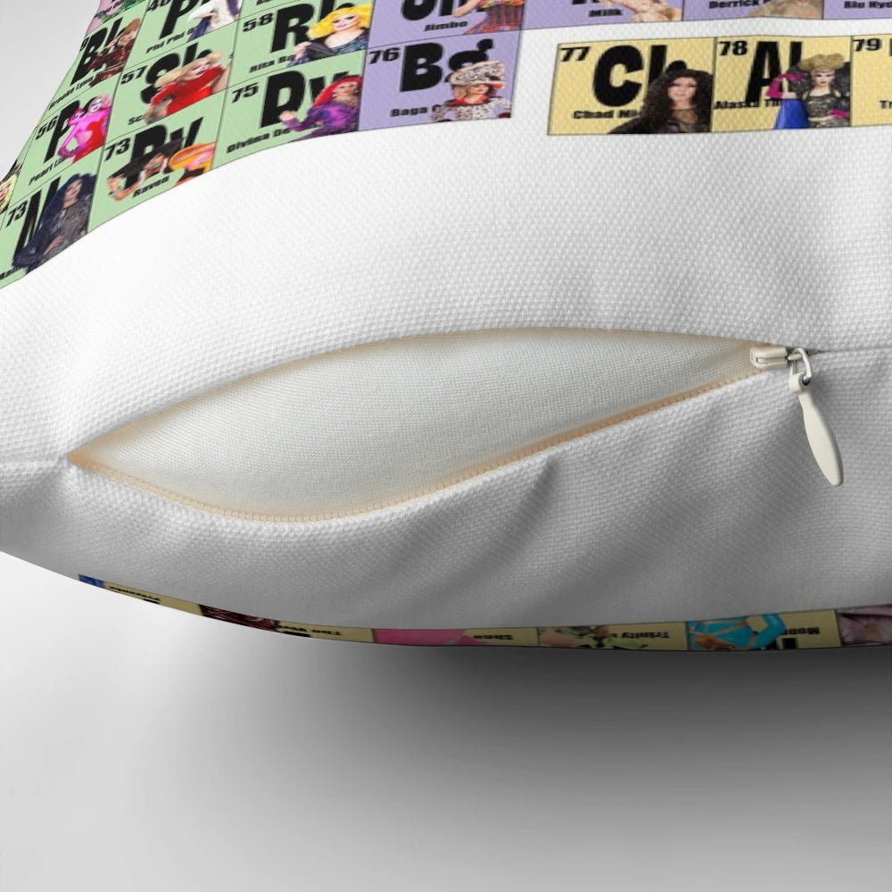 A decorative throw pillow featuring a periodic table design with the names of famous drag queens from RuPaul's Drag Race.