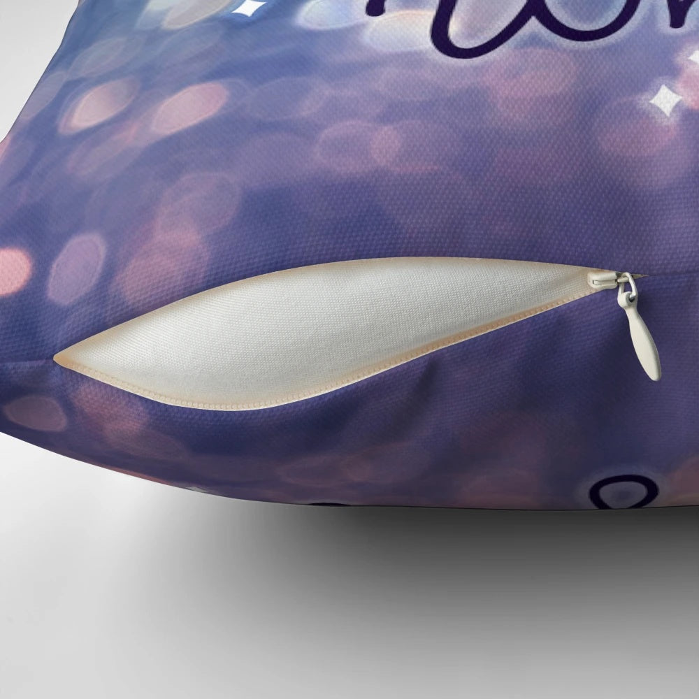 A white pillow with a fairy and glitter design and inspirational typography.