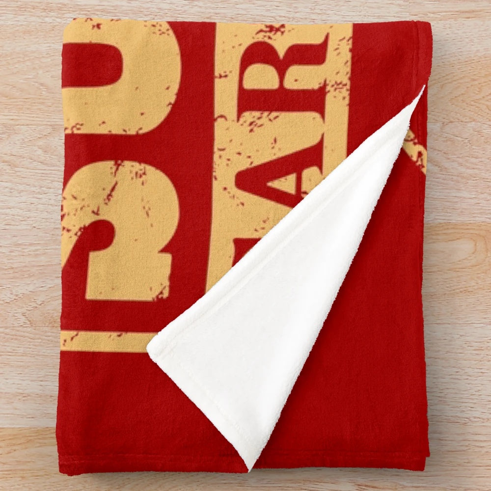 Fallout-inspired plush blanket featuring the Sunset Sarsaparilla logo