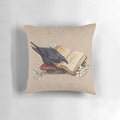 A plush, black and white pillow featuring a whimsical witch's familiar, perfect for adding a touch of occult charm to any room.