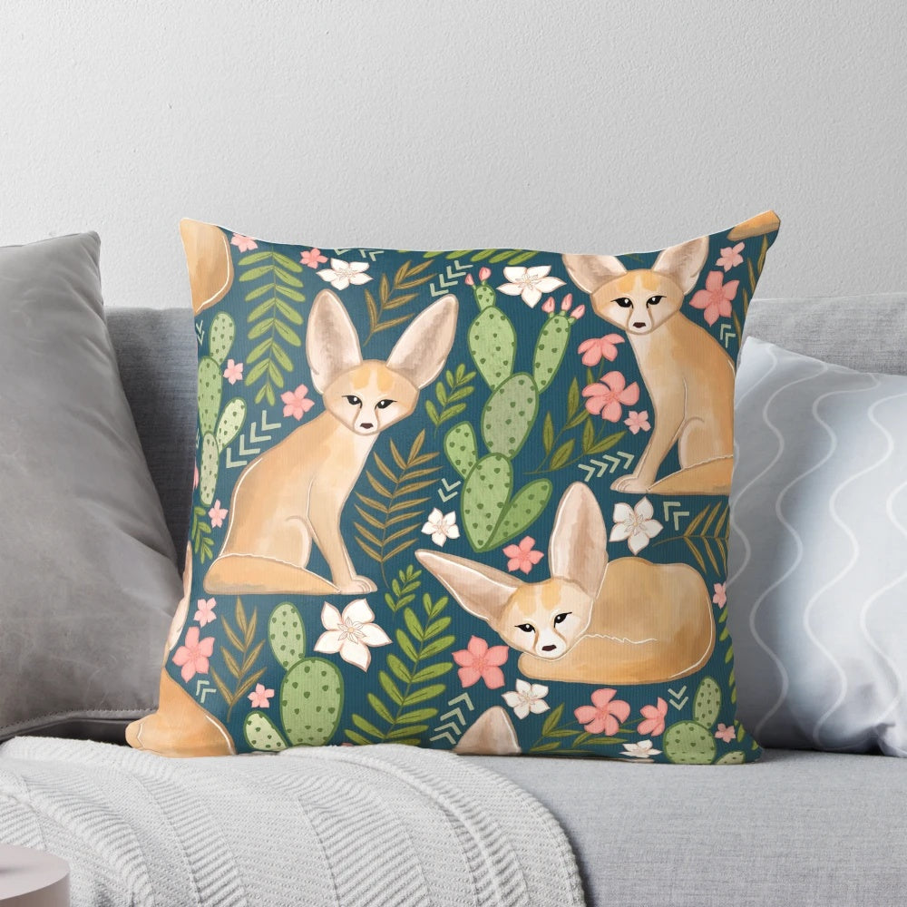 Soft, navy blue pillow featuring a print of enchanting fennec foxes, the small desert-dwelling canines native to the Sahara.
