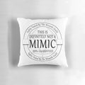 A cozy, safety-tested pillow featuring a mimic design, perfect for fans of fantasy and roleplaying games.