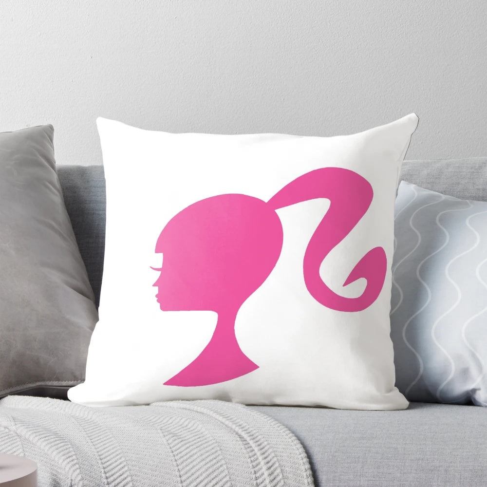 Soft, plush Barbie-themed pillow in pink and white for a girl's room or bedroom.