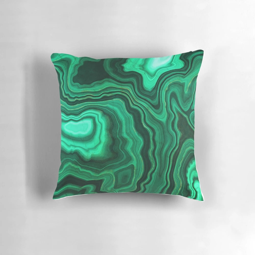 Luxurious green and gold faux malachite marble pillow with a natural, geological textured design