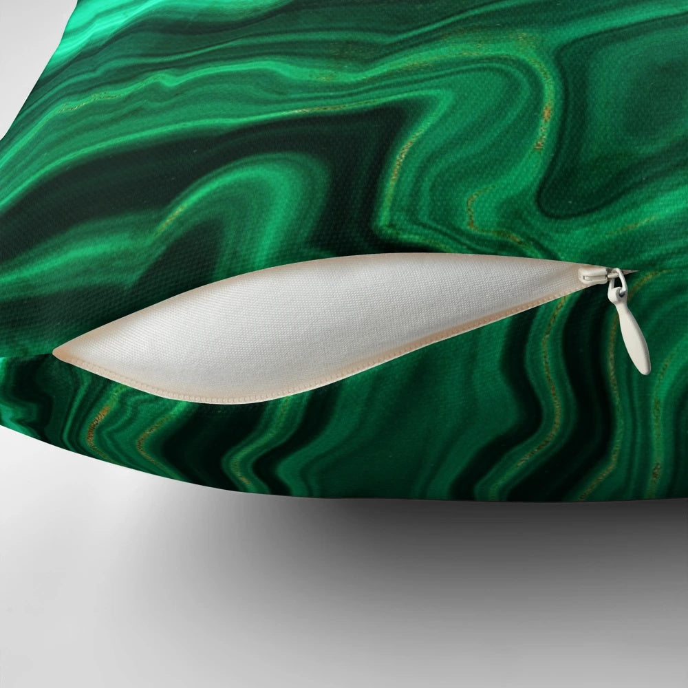 Luxurious green and gold faux malachite marble pillow with a natural, geological textured design
