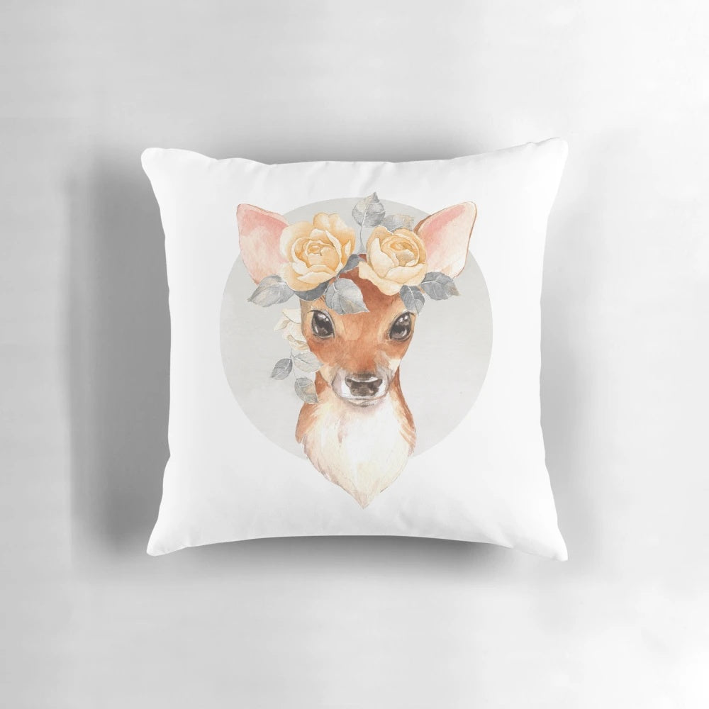 A beautiful hand painted portrait of a fawn surrounded by yellow roses on a soft, velvet pillow.