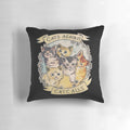A decorative throw pillow featuring a design of cats with flowers, representing a feminist and anti-catcalling message.