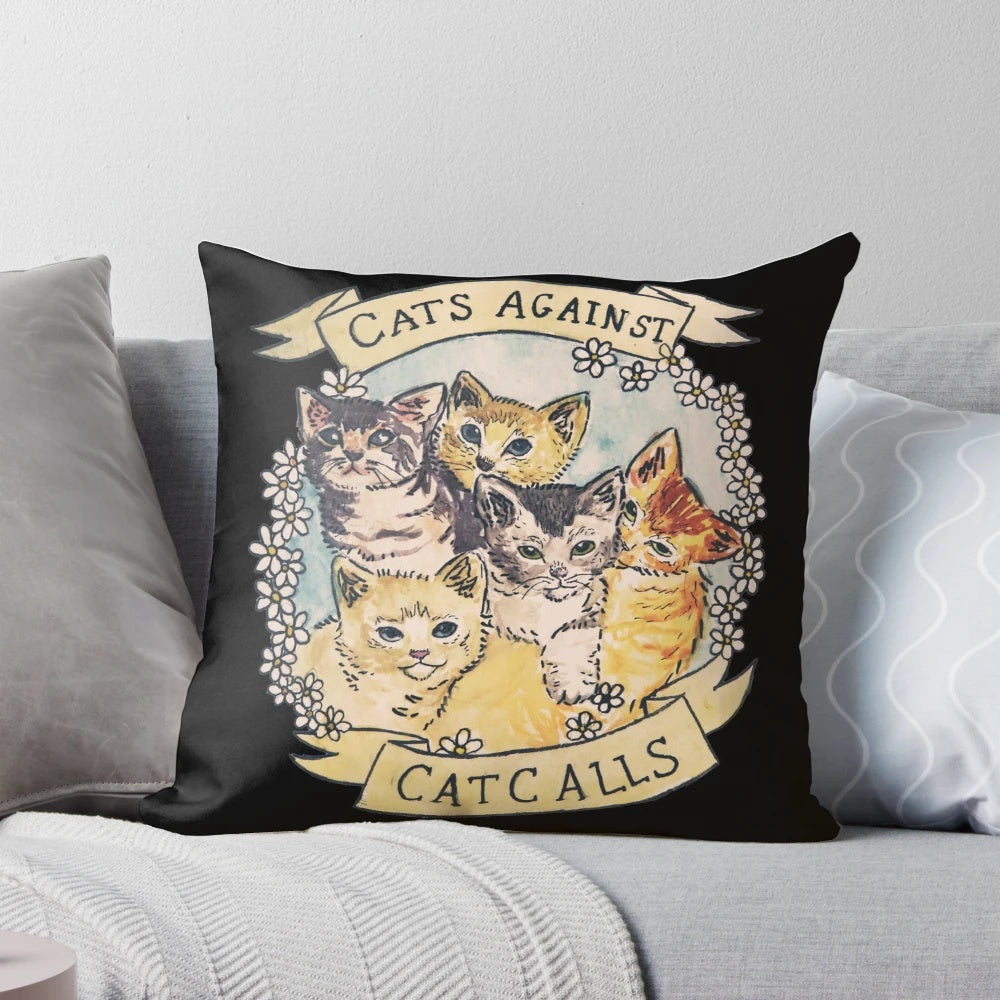 A decorative throw pillow featuring a design of cats with flowers, representing a feminist and anti-catcalling message.