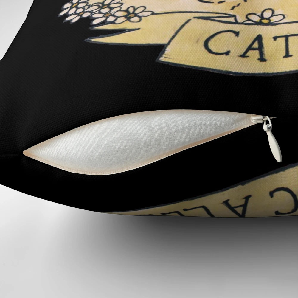 A decorative throw pillow featuring a design of cats with flowers, representing a feminist and anti-catcalling message.