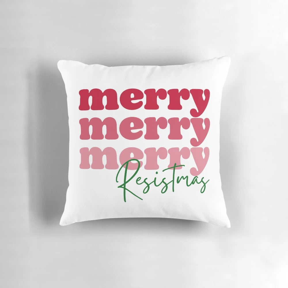 Feminist Christmas quote pillow with "Merry Resistmas" text and modern minimalist graphic design