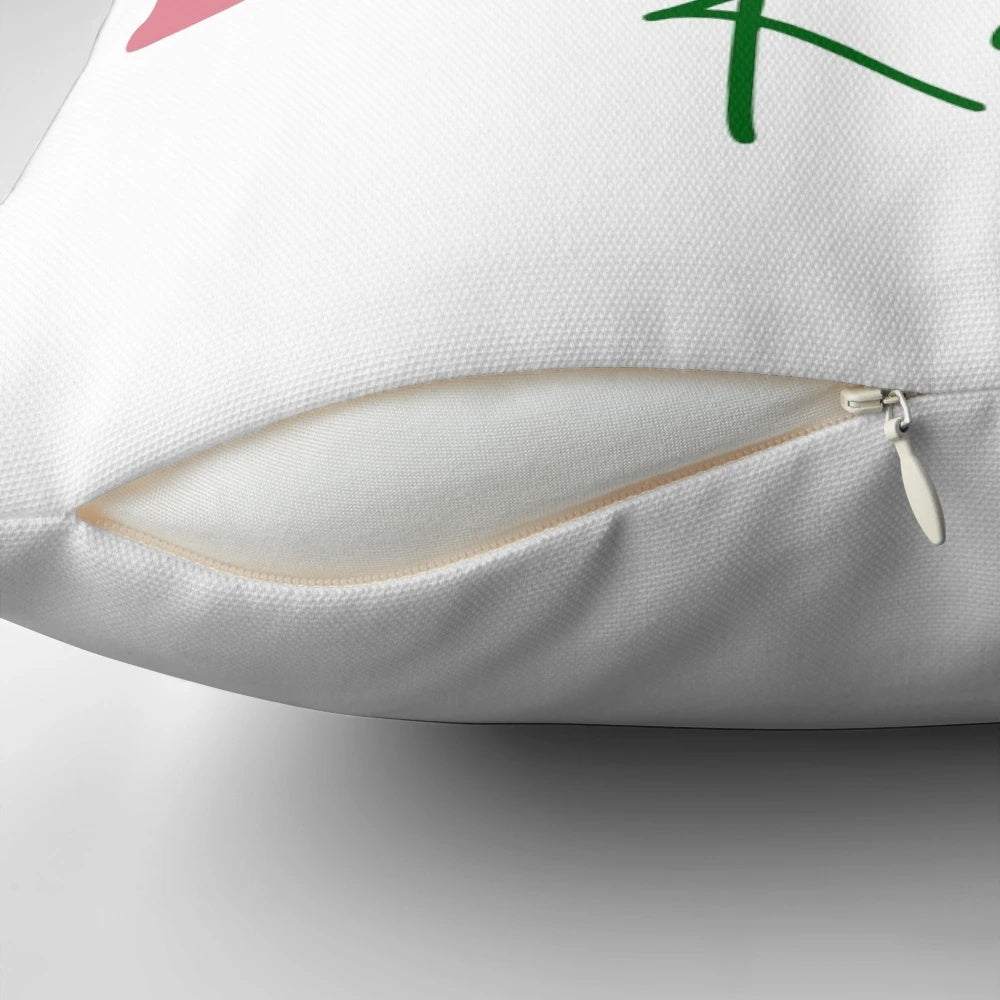Feminist Christmas quote pillow with "Merry Resistmas" text and modern minimalist graphic design