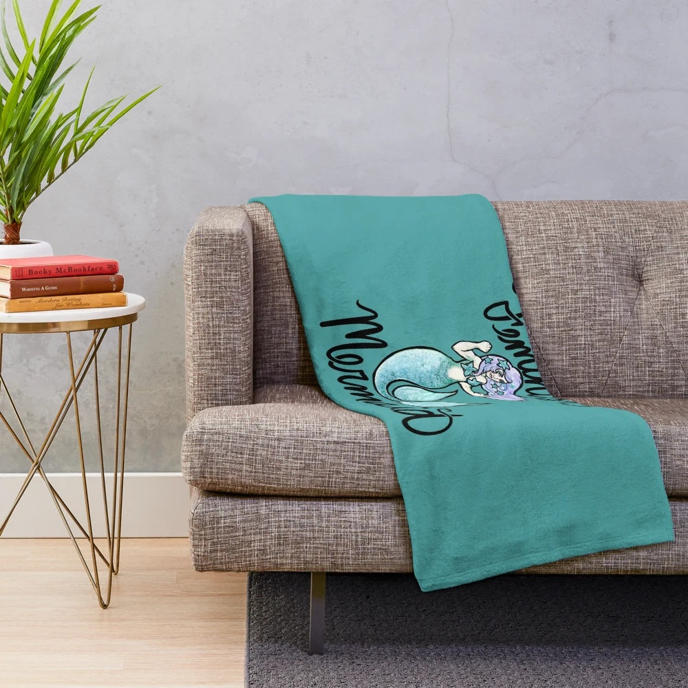 Soft and cozy mermaid-themed plush blanket featuring a feminist message