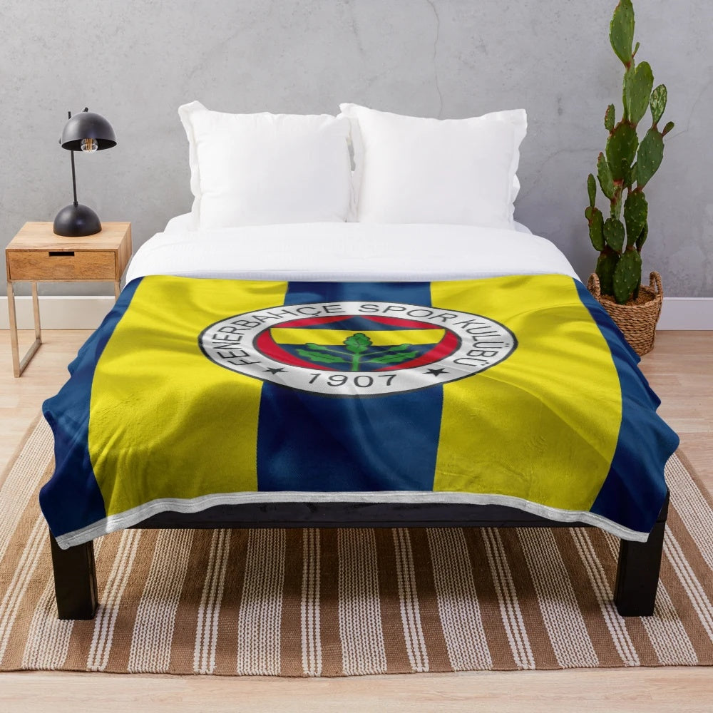 Fenerbahce inspired plush blanket featuring the club's logo and colors