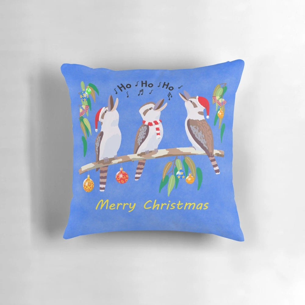 Colorful Christmas pillow featuring a singing kookaburra, a native Australian bird, against a background of holiday carols.