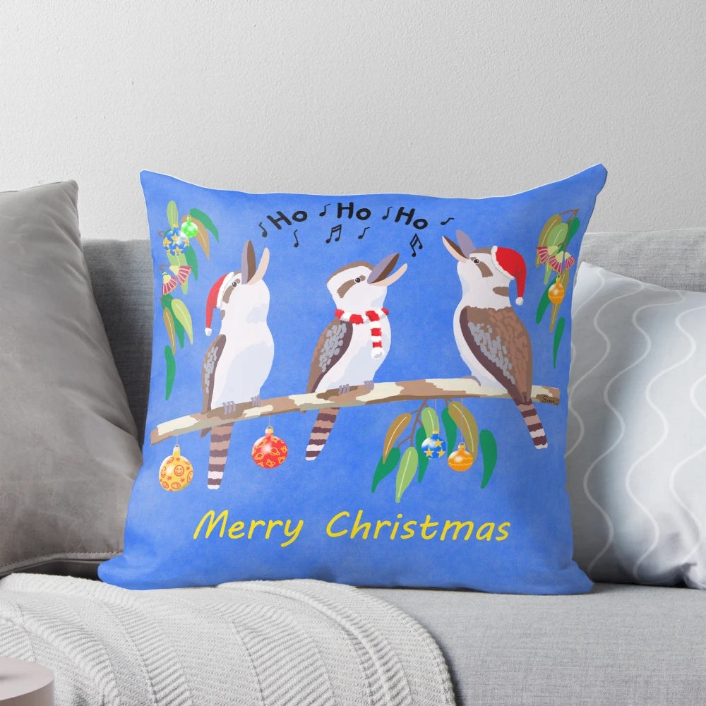 Colorful Christmas pillow featuring a singing kookaburra, a native Australian bird, against a background of holiday carols.