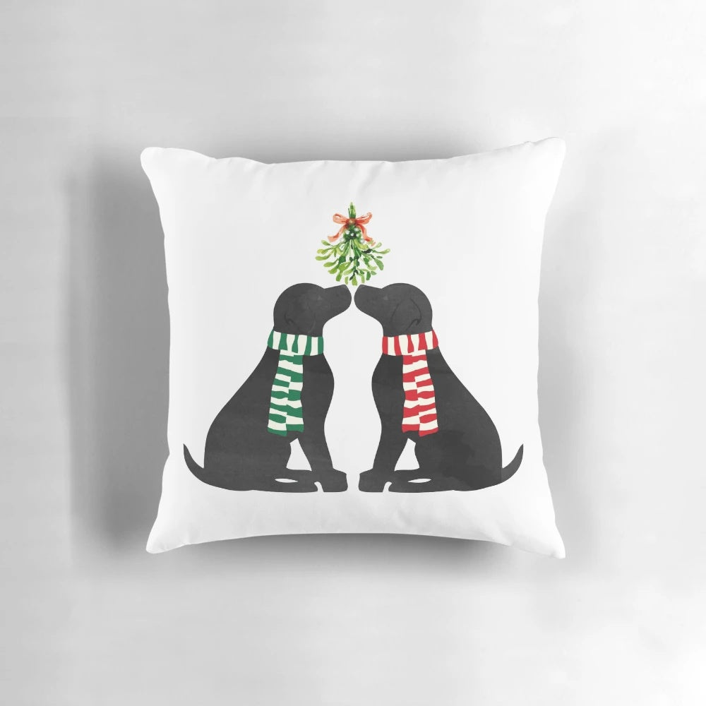 Black labrador dogs kissing under mistletoe on a holiday throw pillow