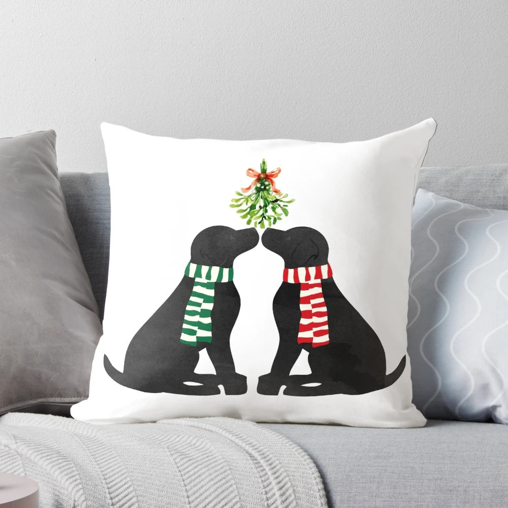 Black labrador dogs kissing under mistletoe on a holiday throw pillow